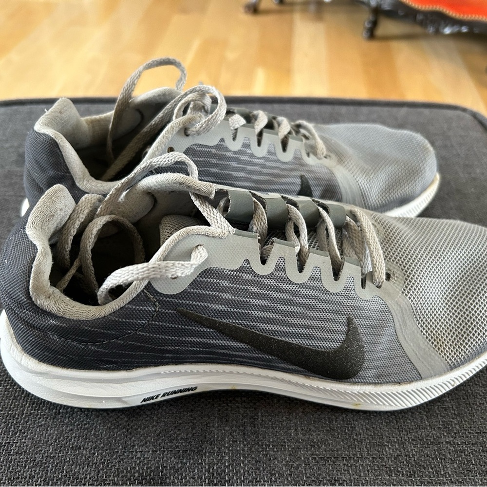 Nike dark grey running shoes. Size 7.5